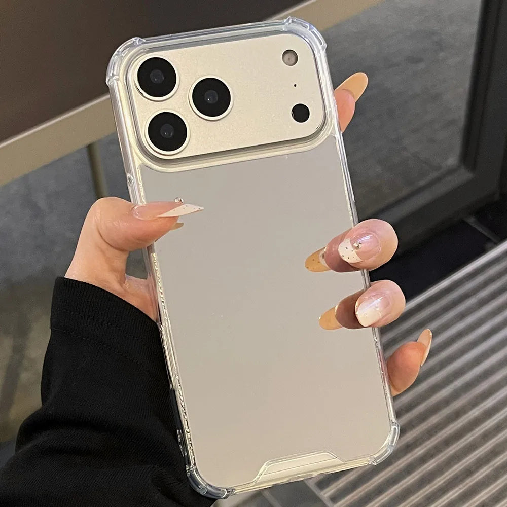 Mirror Case held outdoors reflecting surroundings